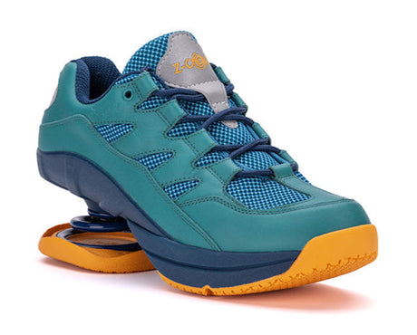Blue athletic shoe with yellow sole on a white background