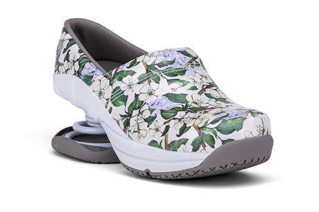 Floral-patterned shoe on a white background